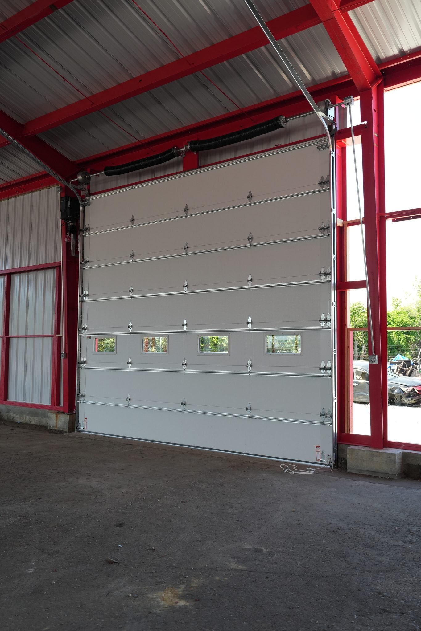 Commercial sectional garage door with windows